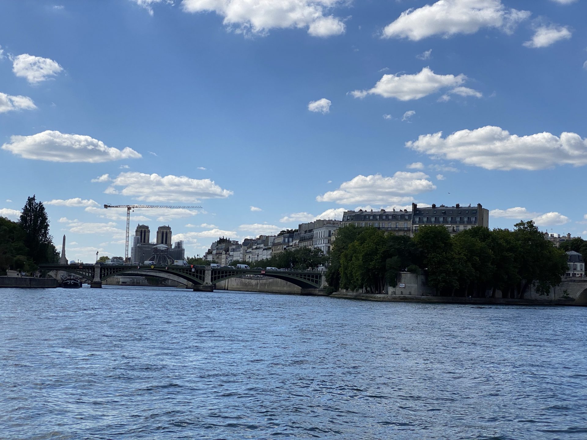 Notre-Dame under construction after entering Seine from Canal Saint-Martin